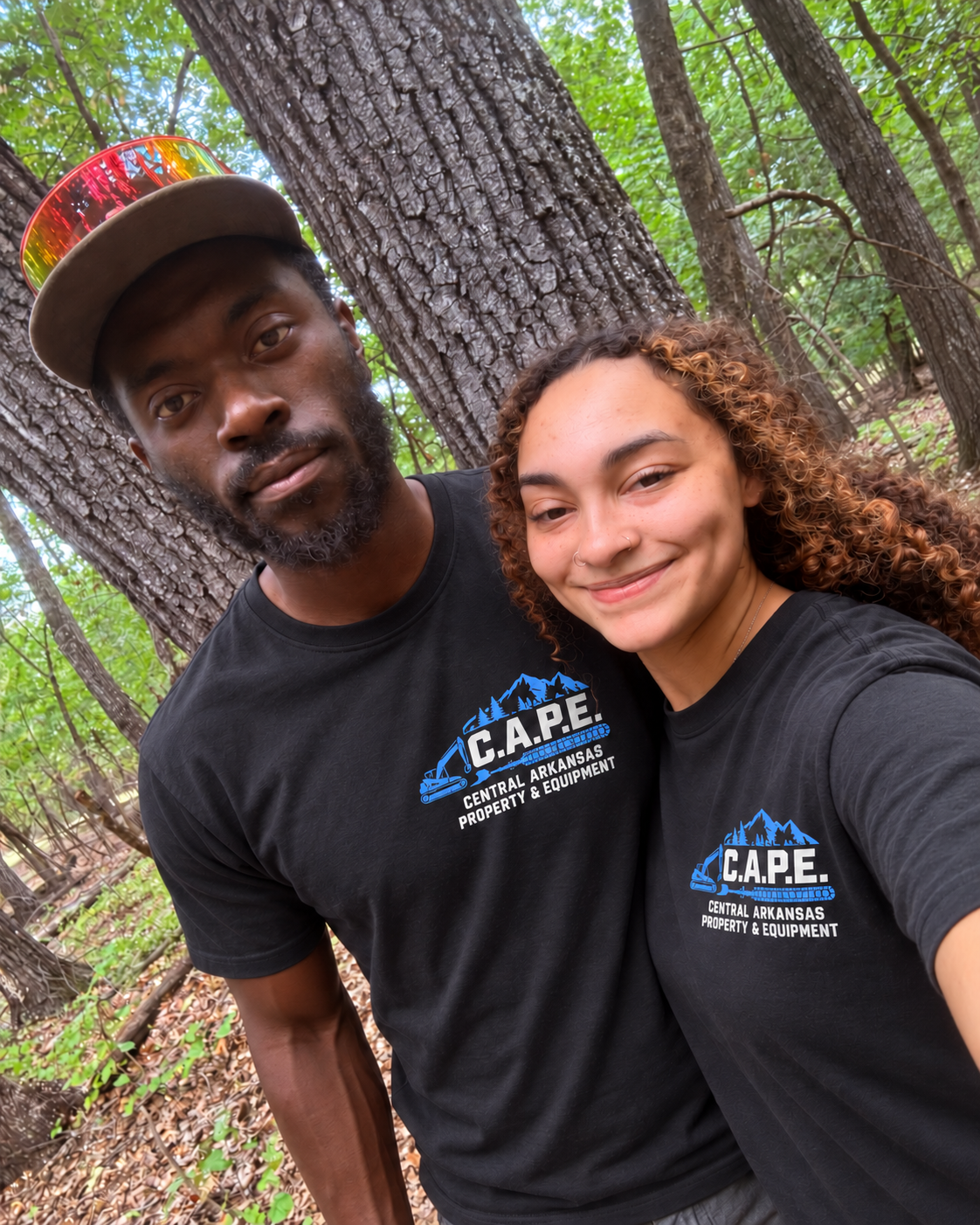 Gabby and Ryan, owners of Central Arkansas Property & Equipment, together outdoors